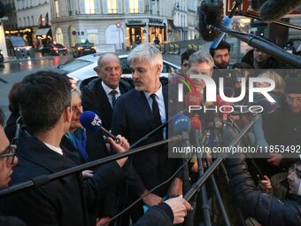 President of the Droite Republicaine parliamentary group, Laurent Wauquiez, speaks to journalists after his meeting with the French presiden...