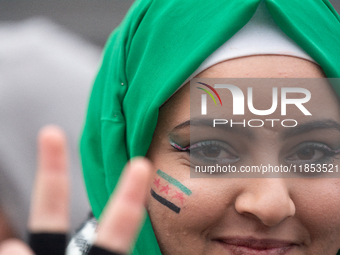 More than a hundred people celebrate post Al Assad in front of Duisburg Central Station in Duisburg, Germany, on December 10, 2024. (