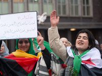 More than a hundred people celebrate post Al Assad in front of Duisburg Central Station in Duisburg, Germany, on December 10, 2024. (