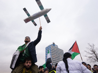 More than a hundred people celebrate post Al Assad in front of Duisburg Central Station in Duisburg, Germany, on December 10, 2024. (