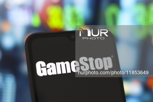 The GameStop logo appears on the screen of a smartphone in Reno, United States, on December 10, 2024. (Photo Illustration by Jaque Silva/Nur...