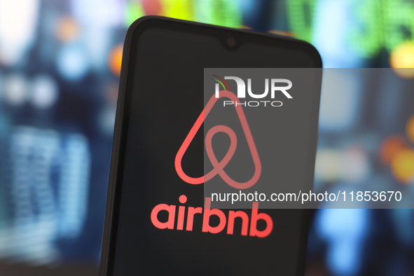 The Airbnb logo appears on the screen of a smartphone in Reno, United States, on December 10, 2024. (Photo Illustration by Jaque Silva/NurPh...