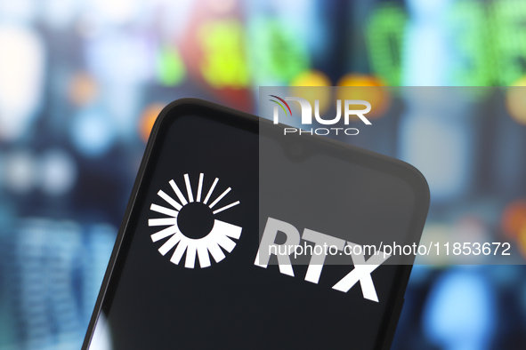 The RTX Corporation logo appears on the screen of a smartphone in Reno, United States, on December 10, 2024. (Photo Illustration by Jaque Si...