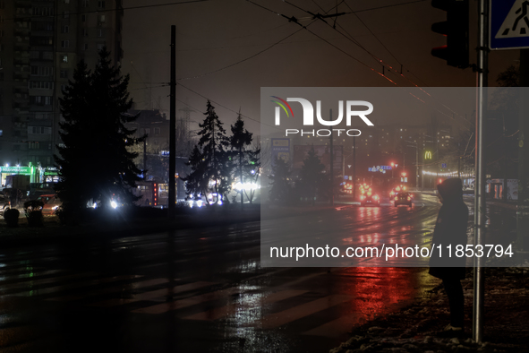 Dark streets and houses during a blackout result from massive Russian missile attacks on Ukraine's energy infrastructure in Kyiv, Ukraine, o...