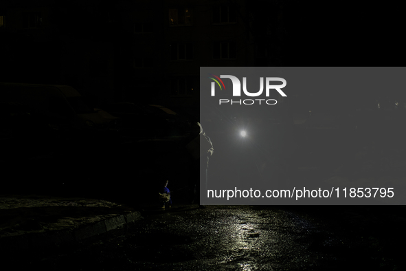 Dark streets and houses during a blackout result from massive Russian missile attacks on Ukraine's energy infrastructure in Kyiv, Ukraine, o...