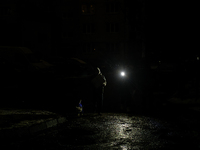 Dark streets and houses during a blackout result from massive Russian missile attacks on Ukraine's energy infrastructure in Kyiv, Ukraine, o...