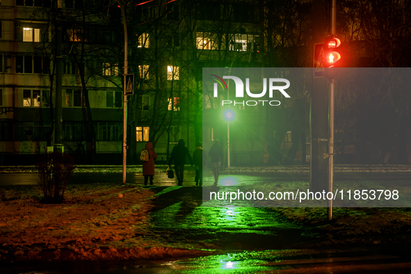 Dark streets and houses during a blackout result from massive Russian missile attacks on Ukraine's energy infrastructure in Kyiv, Ukraine, o...