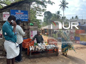 A man sells fish in Nedumangad, Thiruvananthapuram (Trivandrum), Kerala, India, on April 4, 2024. (