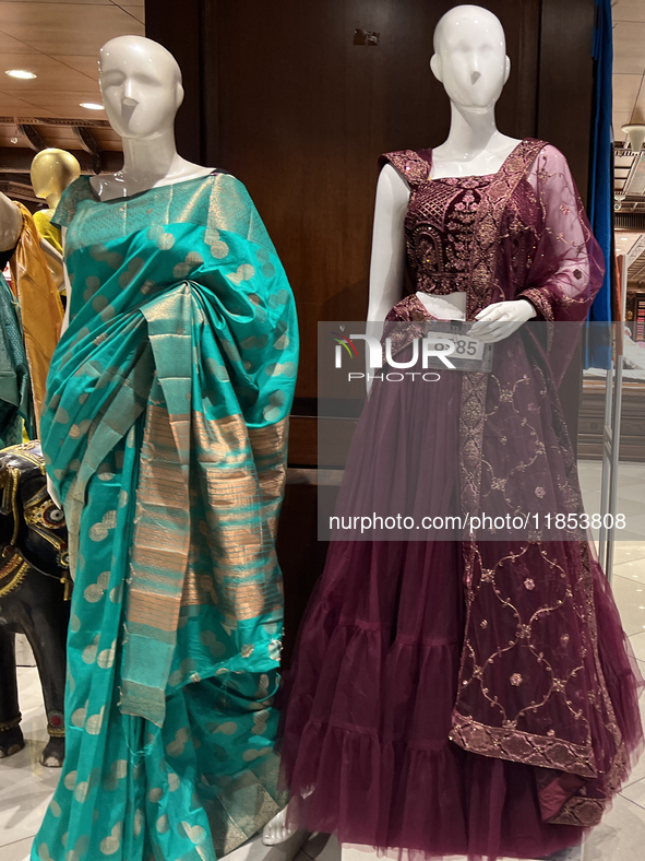 Fancy sarees are displayed at a textile shop in Thiruvananthapuram, Kerala, India, on April 8, 2024. 