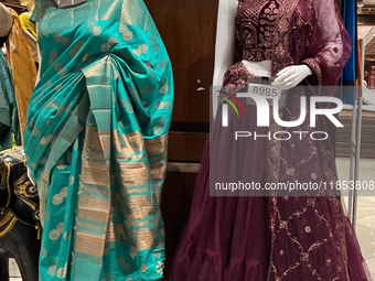 Fancy sarees are displayed at a textile shop in Thiruvananthapuram, Kerala, India, on April 8, 2024. (