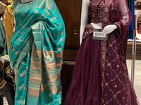 Fancy sarees are displayed at a textile shop in Thiruvananthapuram, Kerala, India, on April 8, 2024. (