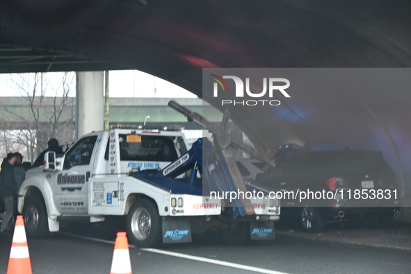 Police find a 53-year-old man inside a vehicle with a gunshot wound to the head on the highway in Bronx, New York, United States, on Decembe...