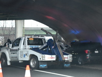 Police find a 53-year-old man inside a vehicle with a gunshot wound to the head on the highway in Bronx, New York, United States, on Decembe...