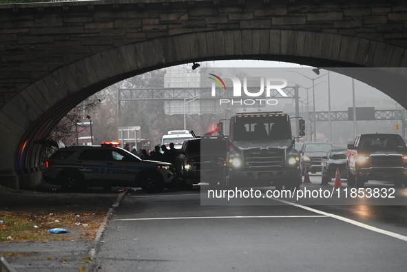 Police find a 53-year-old man inside a vehicle with a gunshot wound to the head on the highway in Bronx, New York, United States, on Decembe...