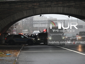 Police find a 53-year-old man inside a vehicle with a gunshot wound to the head on the highway in Bronx, New York, United States, on Decembe...