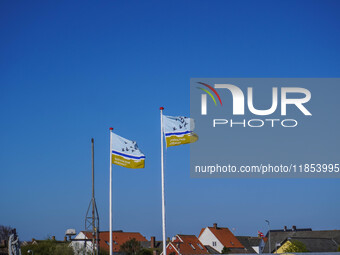 Flags of Wadden Sea National Park are seen in Nordby, Fano Island, Denmark, on April 29, 2024 (