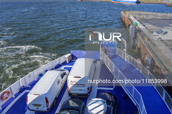 Delivery vans on board a ferry connecting Esbjerg and Fano Island are seen in Nordby, Fano Island, Denmark, on April 29, 2024. 