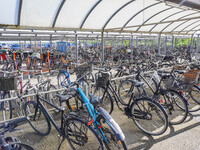 Hundreds of bikes are in the bike parking area in Nordby, Fano Island, Denmark, on April 29, 2024. (