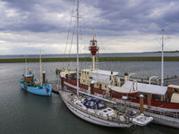 Yachts and ships are in the port in Esbjerg, Denmark, on April 28, 2024. (