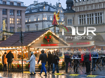 KRAKOW, POLAND - DECEMBER 10:   
A view of the Christmas Market in Krakow’s UNESCO-listed Market Square, with festive stalls and holiday dec...