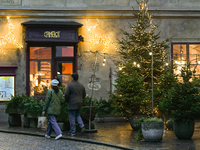 KRAKOW, POLAND - DECEMBER 10:   
A view of Christmas trees and festive decorations outside Camelot Cafe in Krakow’s UNESCO-listed Old Town,...