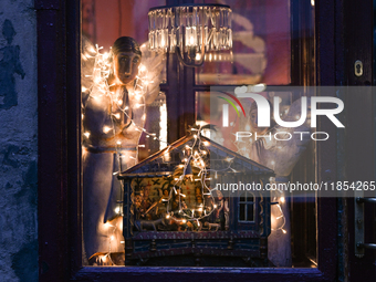 KRAKOW, POLAND - DECEMBER 10:   
A view of Christmas festive decorations adorning the window of Camelot Cafe in Krakow’s UNESCO-listed Old T...