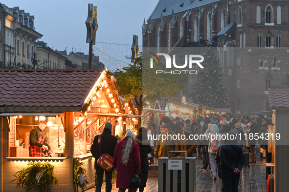 KRAKOW, POLAND - DECEMBER 10:   
A view of the Christmas Market in Krakow’s UNESCO-listed Market Square, with festive stalls and holiday dec...