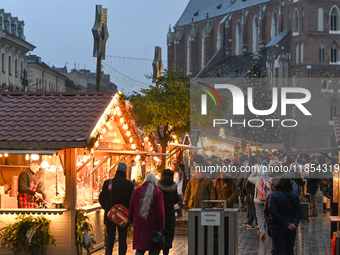 KRAKOW, POLAND - DECEMBER 10:   
A view of the Christmas Market in Krakow’s UNESCO-listed Market Square, with festive stalls and holiday dec...