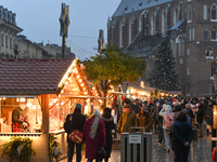 KRAKOW, POLAND - DECEMBER 10:   
A view of the Christmas Market in Krakow’s UNESCO-listed Market Square, with festive stalls and holiday dec...