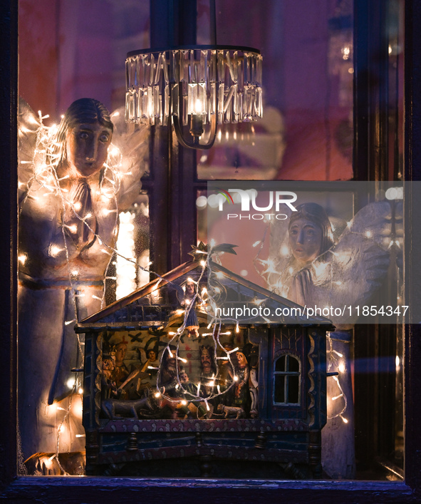 KRAKOW, POLAND - DECEMBER 10:   
A view of Christmas festive decorations adorning the window of Camelot Cafe in Krakow’s UNESCO-listed Old T...