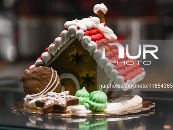 KRAKOW, POLAND - DECEMBER 10:   
A Christmas Cake composition made from traditional Christmas gingerbread displayed in a pastry shop in Krak...