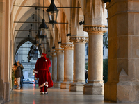 KRAKOW, POLAND - DECEMBER 10:   
A Santa busker walks through the Cloth Hall in Krakow’s UNESCO-listed Market Square, on December 10, 2024 i...