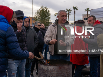 Presidium of Trasnova workers is in Pomigliano d'Arco, Italy, on december 10, 2024, where the banner reads, ''Stellantis, the French colossu...