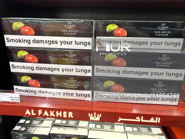 Cartons of cigarettes are at a duty-free shop at Zayed International Airport in Abu Dhabi, United Arab Emirates, on March 28, 2024. 