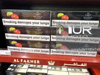 Cartons of cigarettes are at a duty-free shop at Zayed International Airport in Abu Dhabi, United Arab Emirates, on March 28, 2024. (