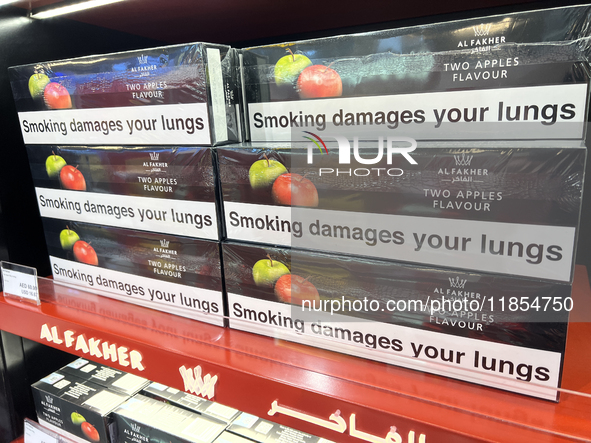 Cartons of cigarettes are at a duty-free shop at Zayed International Airport in Abu Dhabi, United Arab Emirates, on March 28, 2024. 