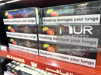 Cartons of cigarettes are at a duty-free shop at Zayed International Airport in Abu Dhabi, United Arab Emirates, on March 28, 2024. (