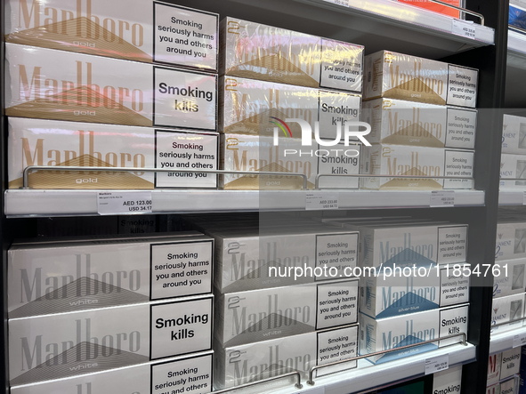 Cartons of cigarettes are at a duty-free shop at Zayed International Airport in Abu Dhabi, United Arab Emirates, on March 28, 2024. 