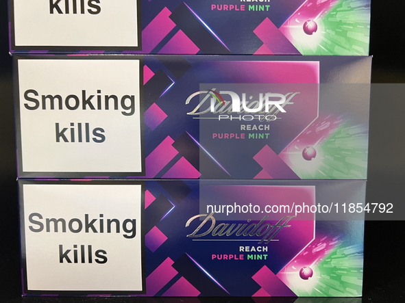 Cartons of cigarettes are at a duty-free shop at Zayed International Airport in Abu Dhabi, United Arab Emirates, on March 28, 2024. 