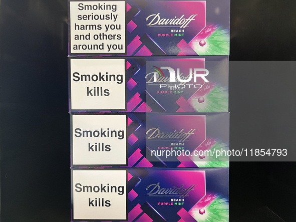 Cartons of cigarettes are at a duty-free shop at Zayed International Airport in Abu Dhabi, United Arab Emirates, on March 28, 2024. 