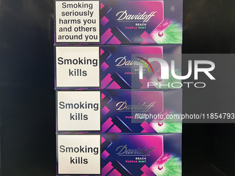 Cartons of cigarettes are at a duty-free shop at Zayed International Airport in Abu Dhabi, United Arab Emirates, on March 28, 2024. (