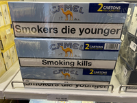 Cartons of cigarettes are at a duty-free shop at Zayed International Airport in Abu Dhabi, United Arab Emirates, on March 28, 2024. (