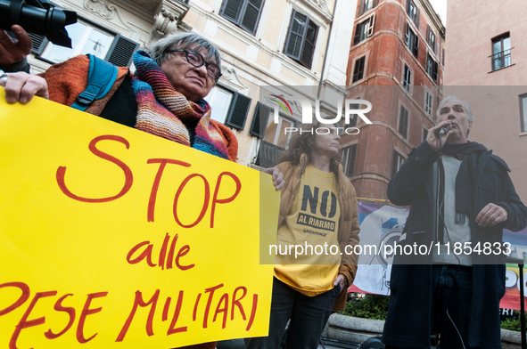 Pacifists protest against the increase in military spending and in favor of human rights in Piazza Capranica near the Chamber of Deputies Pi...