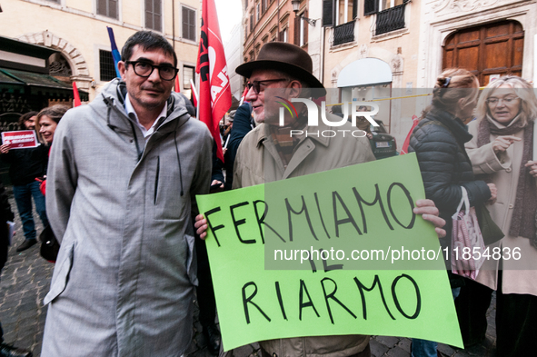 Pacifists protest against the increase in military spending and in favor of human rights in Piazza Capranica near the Chamber of Deputies Pi...