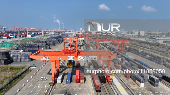 A train prepares to depart at the Qinzhou Railway Container Center station in Guangxi Zhuang Autonomous Region, China, on December 5, 2024. 