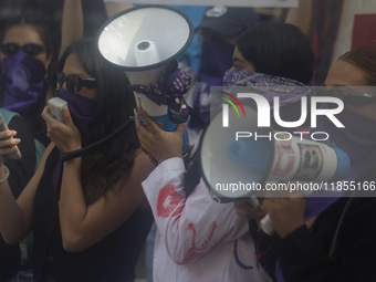 Victims of sexual and digital violence demonstrate outside the National Polytechnic Institute in Mexico City, Mexico, on December 10, 2024,...