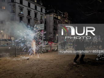 In Frankfurt am Main, Hesse, Germany, on January 1, 2024, people celebrate New Year's Eve by setting off fireworks, bangers, and firecracker...