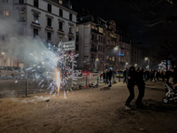 In Frankfurt am Main, Hesse, Germany, on January 1, 2024, people celebrate New Year's Eve by setting off fireworks, bangers, and firecracker...