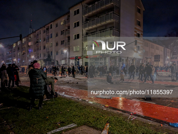 In Frankfurt am Main, Hesse, Germany, on January 1, 2024, people celebrate New Year's Eve by setting off fireworks, bangers, and firecracker...