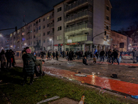 In Frankfurt am Main, Hesse, Germany, on January 1, 2024, people celebrate New Year's Eve by setting off fireworks, bangers, and firecracker...